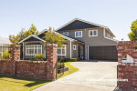 house exterior, brown exterior, painted weatherboards, garden, front entrance, brown house 