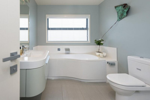 blue bathroom, beach house, white cabinetry, interior