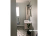 ensuite, bathroom, green ensuite, green bathroom, patterned tiled floors resene robin egg blue 