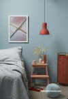 bedroom, blue bedroom, blue and orange, orange accessories, blue feature wall