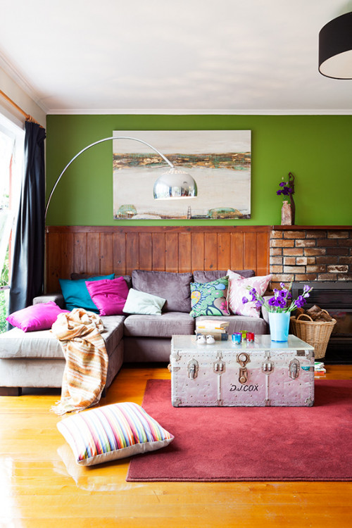 green living room, lounge, interior, home decorating ideas, brick fireplace, painted feature wall