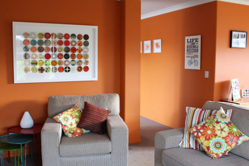 lounge, living room, orange lounge, orange living room, bright living room, orange paint