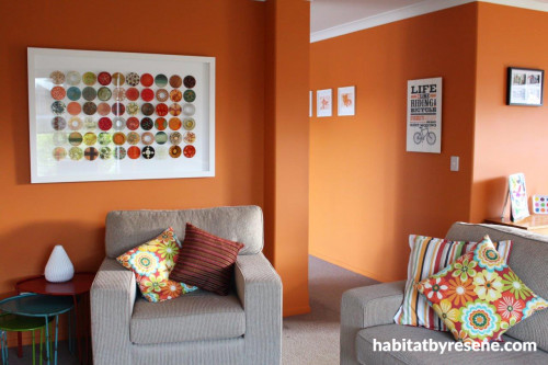 lounge, living room, orange lounge, orange living room, bright living room, orange paint 