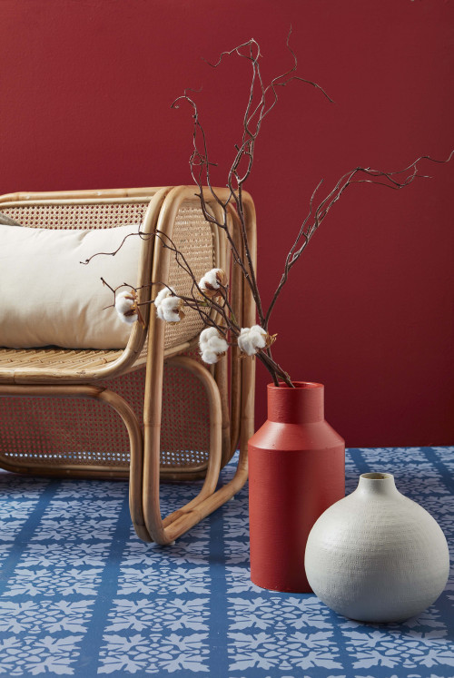 sitting room, living room, red living room, red feature wall, blue patterned floor, painted vases