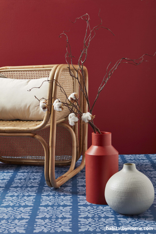 sitting room, living room, red living room, red feature wall, blue patterned floor, painted vases 