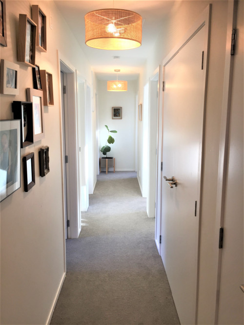 hallway, white hallway, neutral hallway, resene rice cake, white paint, white painted walls