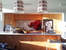 bach, holiday home, beach house, kitchen, pohutukawa splashback, floral lightshades