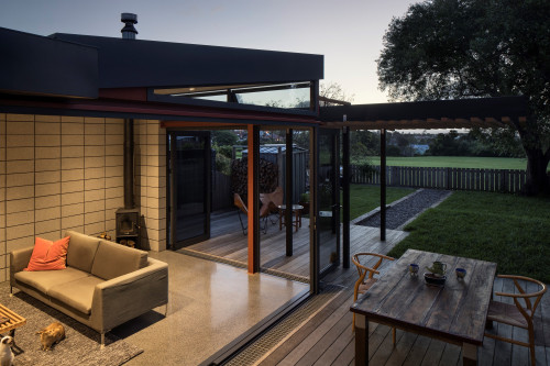 outdoor living, deck, open plan living, concrete flooring, renovated villa, black roofing