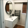 bathroom, white bathroom, neutral bathroom, resene black white, wood flooring, renovated bathroom