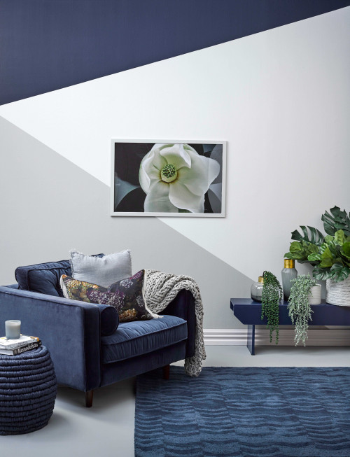 lounge, living room, blue lounge, geometric feature wall, triangle feature wall, sitting room