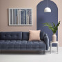 lounge, living room, painted feature wall, pink lounge, blue couch, blue and pink 