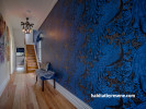 hallway, blue wallpaper, peacock wallpaper, blue feature wall, wallpaper feature, blue hallway 