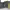 1970s home, house exterior, sleepout, grey exterior, green door, grey sleepout
