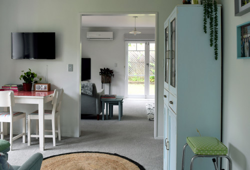 leadlight cabinet, blue cabinet, living room, lounge, blue side tables, grey living room