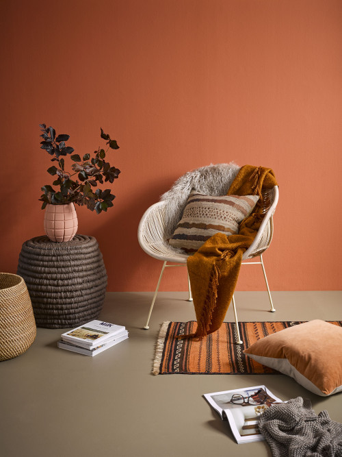 Occasional chair, warm oranges, natural fibres, rug, reading corner, Resene