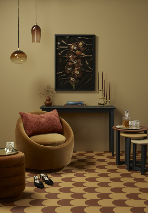 Nesting tables, light fittings, round chair, patterned floor, candles, Resene