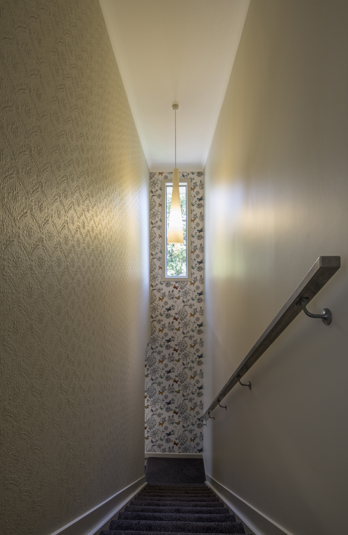 1970s house, paint ideas, paint trends, stairwell, stairs, wall paper