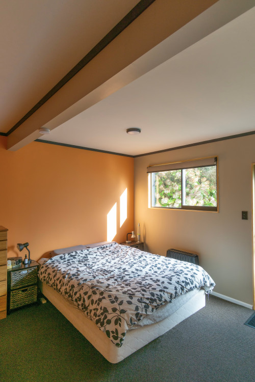 bedroom inspiration, bedroom ideas, peach interior, terracotta interior, orange feature wall, resene