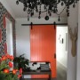 orange barn door, white walls, orange paint, rustic door, resene tangerine