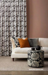 lounge, living room, brown lounge, brown living room, patterned curtains, dusky red walls