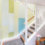 1960's house, stairwell, painted staircase, painted wall panels, retro house ideas 