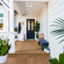 entranceway, front porch, house exterior, white house, white exterior, blue front door
