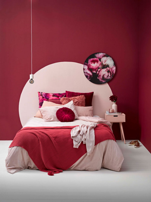 bedroom, red bedroom, red and pink bedroom, red feature wall, circle painted bedhead