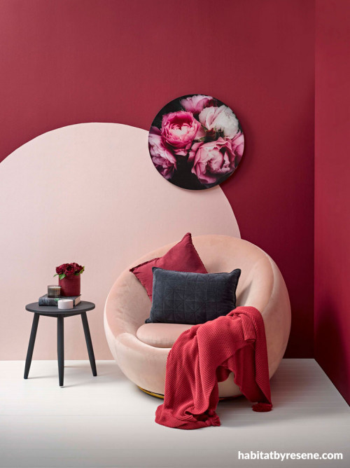 reading nook, red and pink, red wall, pink chair, feature wall, painted circle, circle wall