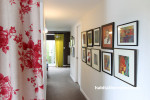 white hallway, white paint, gallery wall, white interior