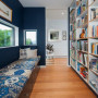 library, blue interiors, reading nook, bookshelves, window seat, paint ideas