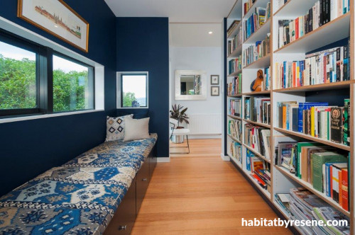 library, blue interiors, reading nook, bookshelves, window seat, paint ideas