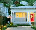 Red front door villa Resene Poppy