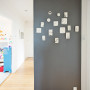 accent wall, hallway decor, grey wall, mounted art, Resene 