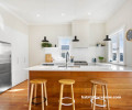 White kitchen wooden island