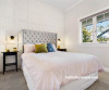 Bedroom white walls panelling