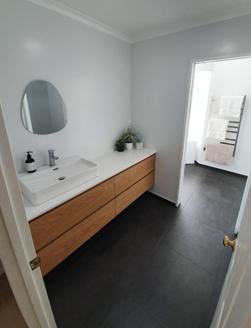 This Gulf Harbour home was brought uptodate with a clean palette of